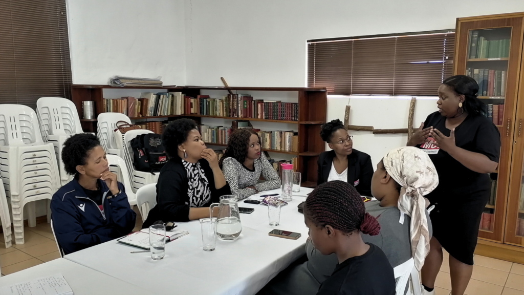 image of a mot coach and coordinator speaking at MOT SA Stakeholder Meeting in Eastern Cape Scatec (2)