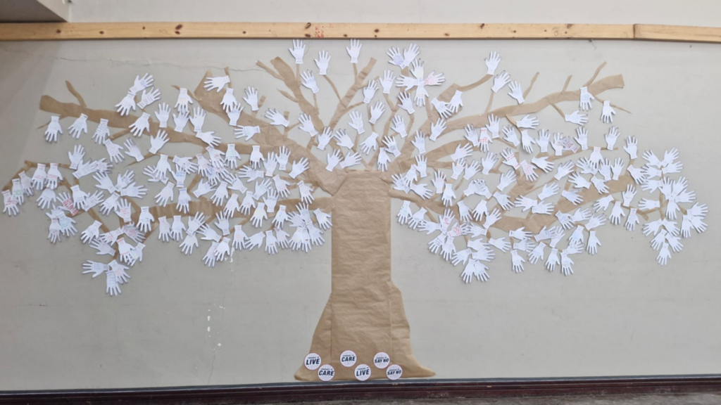 tree of courage hands mot south africa